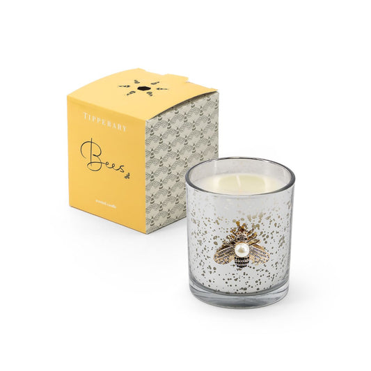 Pink Jasmine & Sandalwood Bees Collection Scented Candle  Experience the perfect balance of sweet and woody with this Pink Jasmine & Sandalwood scented candle from the Tipperary Bees Collection. Crafted with care this candle is sure to bring a pleasant aroma to any room.