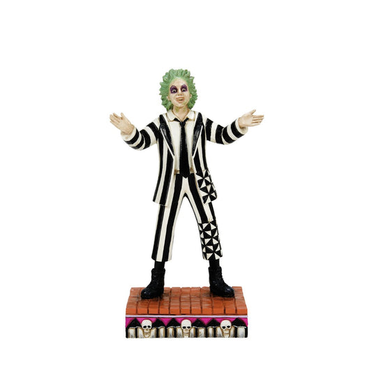 Beetlejuice, Beetlejuice, Beetlejuice... He's here. The iconic bio-exorcist from the 1988 Tim Burton film has arrived and this time, he has a Jim Shore twist. Crafted from high quality cast stone and hand-painted, this figurine features the main (dead) man himself in his classic black &amp; white striped suit, ready to get to work ridding your home of the pesky living.