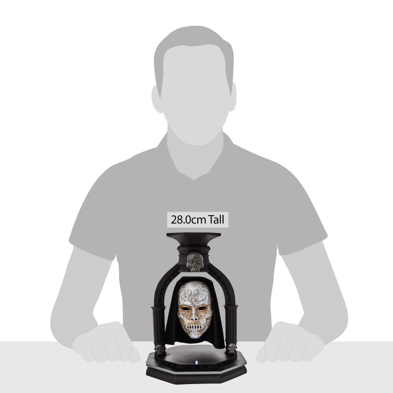 NEW and exclusively from Enesco is the Bellatrix Lestrange Levitating Death Eater Mask. This piece works using polarized magnets to hold the mask in place, floating in mid air with an LED light indicating when the magnet is activated.