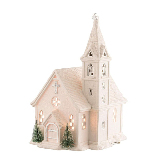Christmas Church Lamp by Belleek Living  This Church Lamp is an exciting piece from Belleek Living. Shaped like a church the detail that this piece brings is exceptional. Timely pierced holes allow subtle light to shine through letting it reinact a Christmas scene of people in the church at the most special time of year.