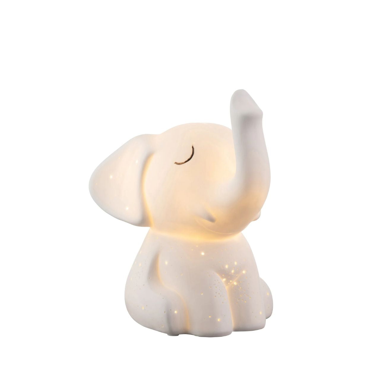 This charming elephant shaped luminaire features a raised trunk, a happy little face and pierced with a starlight pattern. When lit the porcelain body illuminates emitting a soft gentle glow highlighting all the details in this charming lamp, perfect for any animal lover.