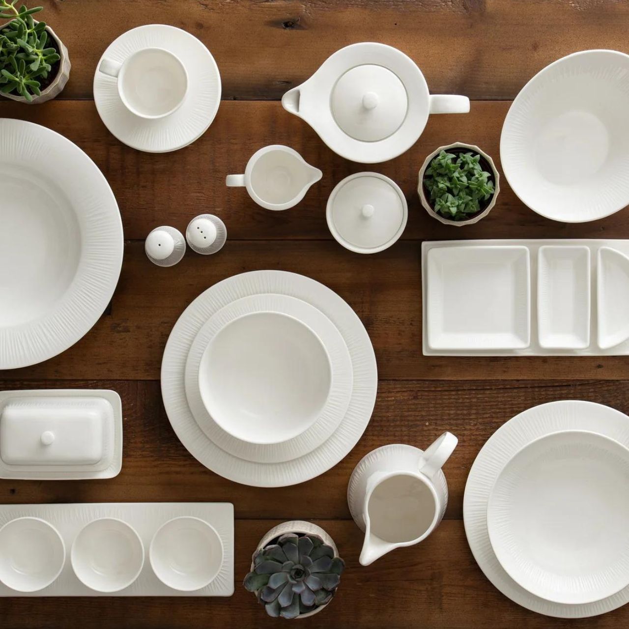 The Erne tableware collection is crafted from crisp white porcelain, featuring a subtle linear pattern inspired by the banks of the Lough Erne. A simple and striking collection, Erne is ideal for elegant celebrations yet practical and perfect for everyday use. This timeless design will appeal to both contemporary minimalist tastes or more traditional sensibilities, merging seamlessly into your home and style.