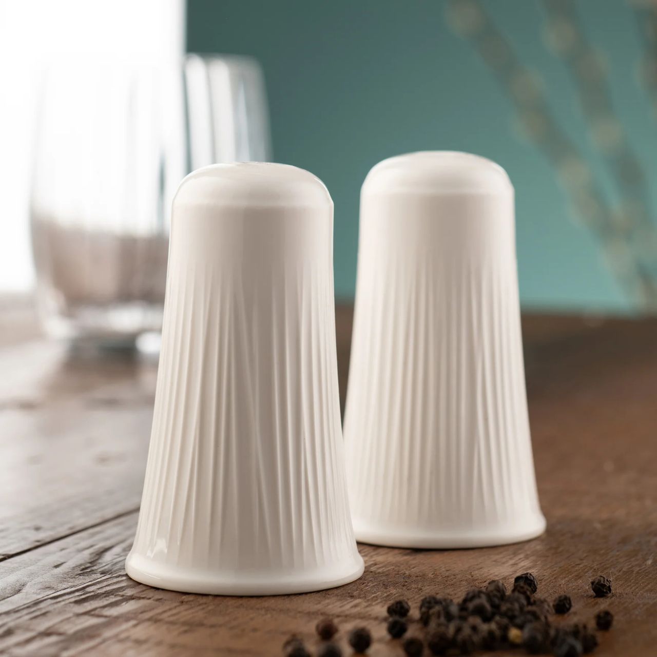 The Erne tableware collection is crafted from crisp white porcelain, featuring a subtle linear pattern inspired by the banks of the Lough Erne. 
