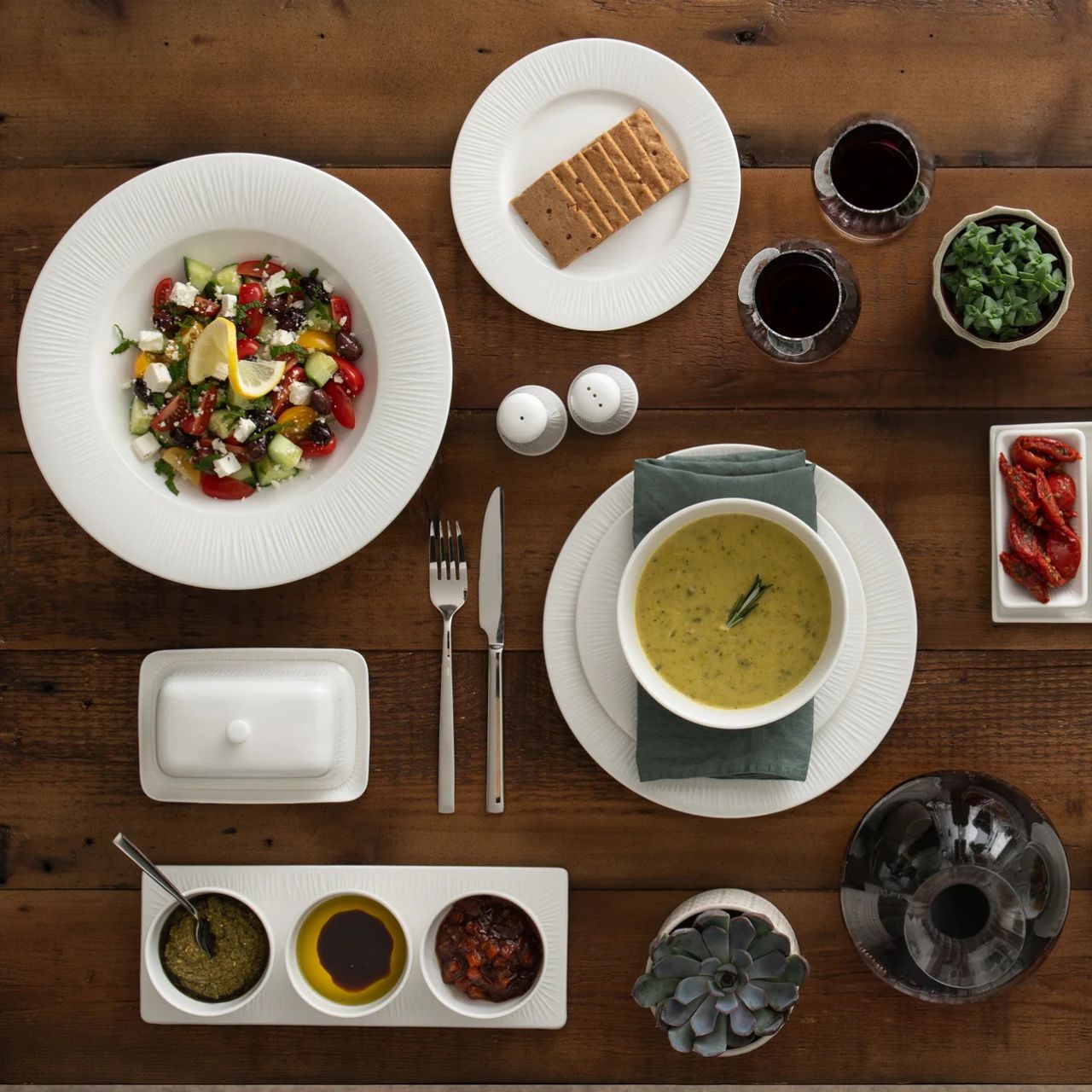 The Erne tableware collection is crafted from crisp white porcelain, featuring a subtle linear pattern inspired by the banks of the Lough Erne. 