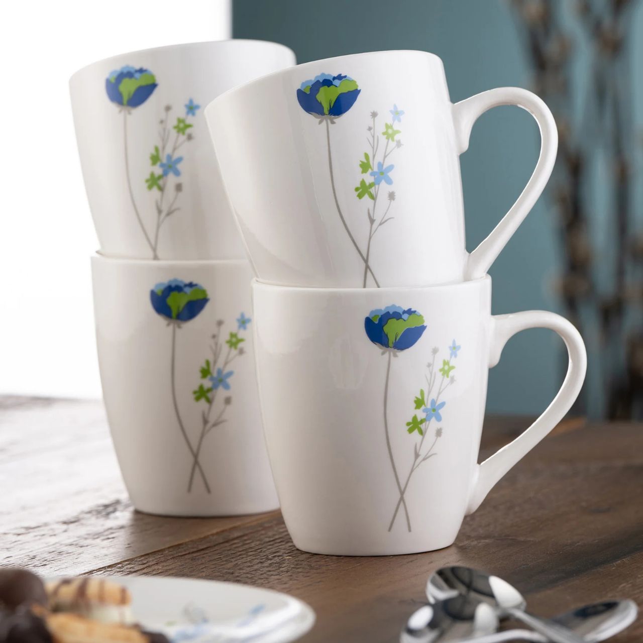 Indigo Bloom features floral motifs in bright blues and greens making a bold statement for your table. &nbsp;Suitable for microwave and dishwasher, this set is perfect for everyday use.
