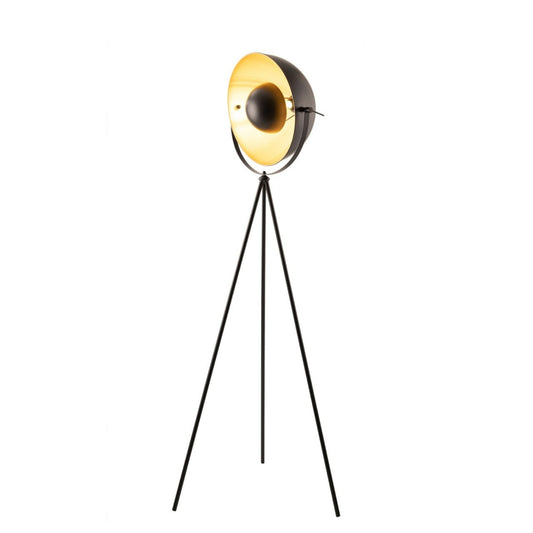 The Nyhavn Floor Lamp is a true statement piece inspired by retro studio lighting. The matt black finish is contrasted with warm gold tones. The black centre piece creates a soft diffused lighting effect, ideal for creating atmospheric mood lighting.