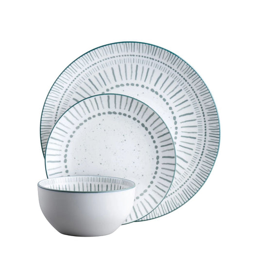 The Vigo tableware features a playful and painterly pattern in a tranquil teal tone. Vigo is suitable for both microwave and dishwasher, making it ideal for everyday use.