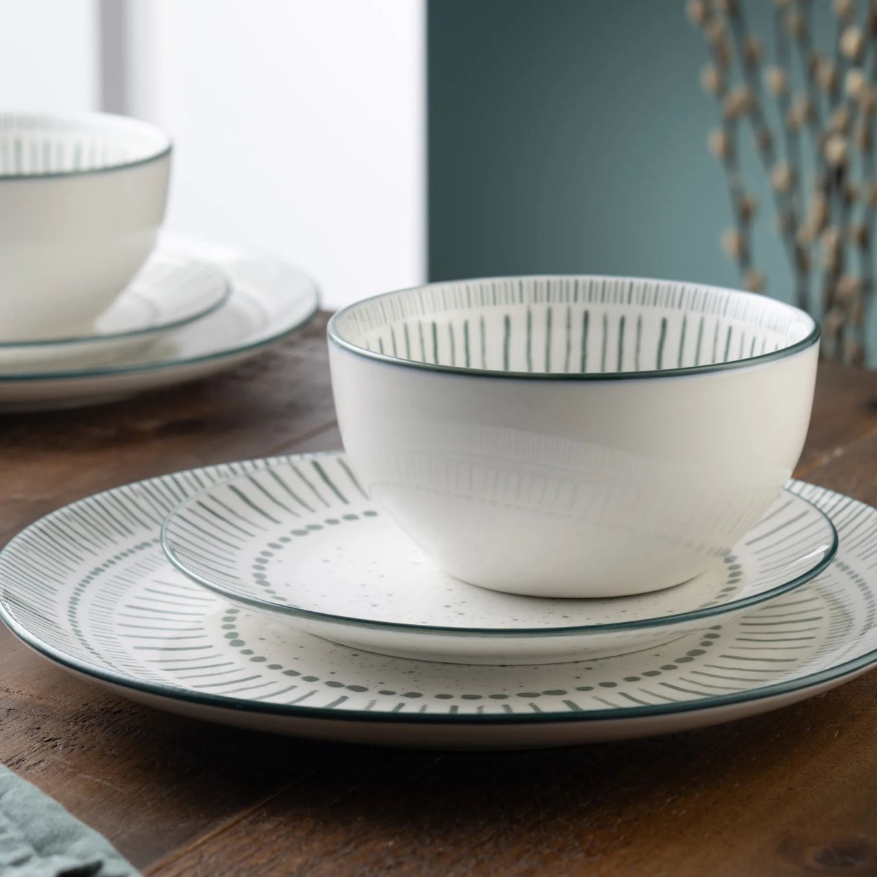 The Vigo tableware features a playful and painterly pattern in a tranquil teal tone. Vigo is suitable for both microwave and dishwasher, making it ideal for everyday use.