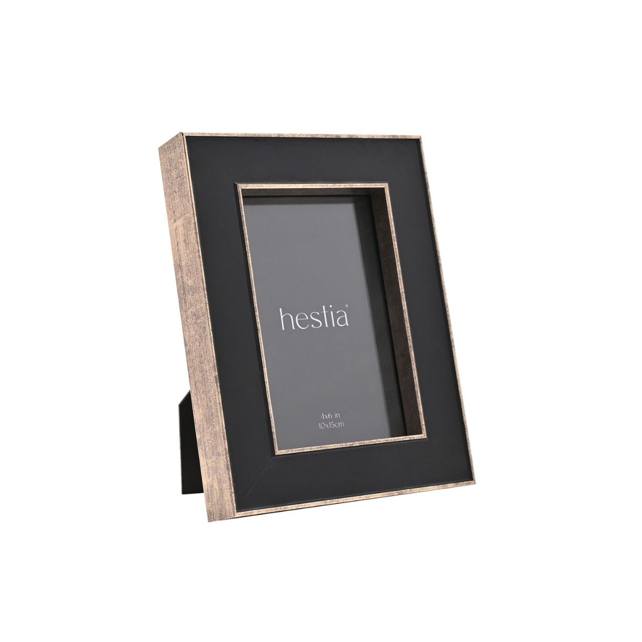 Introduce a touch of sophistication to your home with the Hestia Black Box Frame with Gold Edge. This striking piece, with its black matte finish and metallic gold border, gives your memories a chic and modern backdrop.