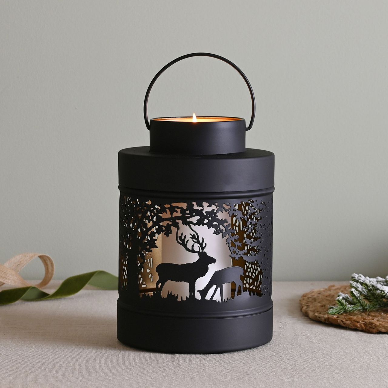 Christmas Black Forest Scene Round Lantern Medium  A medium black forest scene lantern by THE SEASONAL GIFT CO.  This enchanting lantern glistens with festive charm throughout the Christmas period.