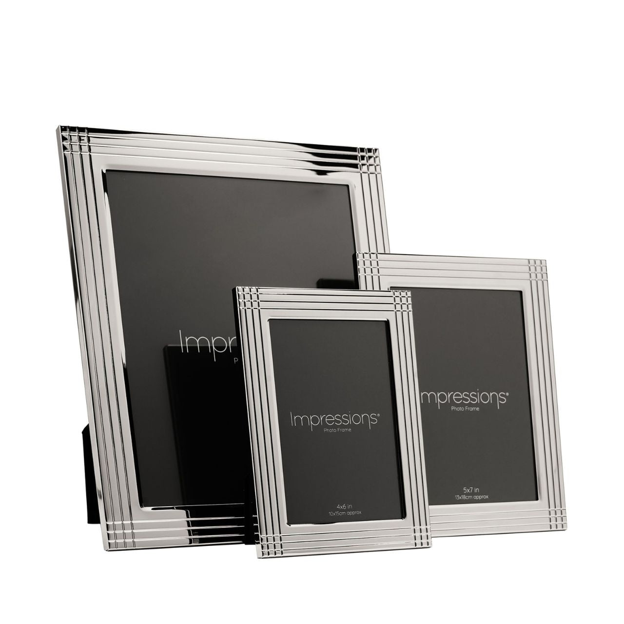 The Impressions Border Stripe Metal Plated Silver Photo Frame 4" x 6" offers a clean, contemporary way to display treasured photographs. Featuring a sleek silver-plated finish with subtle striped border detailing, it brings a refined touch to any home or office setting.