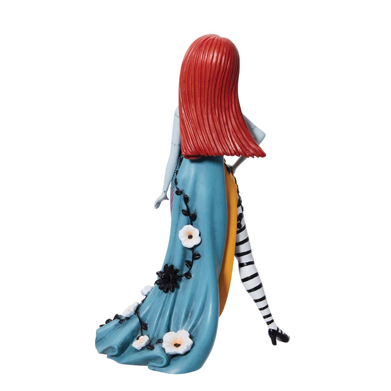 Disney Showcase Botanical Sally Figurine  Sally from Tim Burton's The Nightmare Before Christmas has updated her rag doll dress into a stunning gown with sculpted thistles and vines going down the dress. Hand-painted by skilled artisans, Sally shines in her recognisable dress from the film. Perfect for any Nightmare Before Christmas fan.