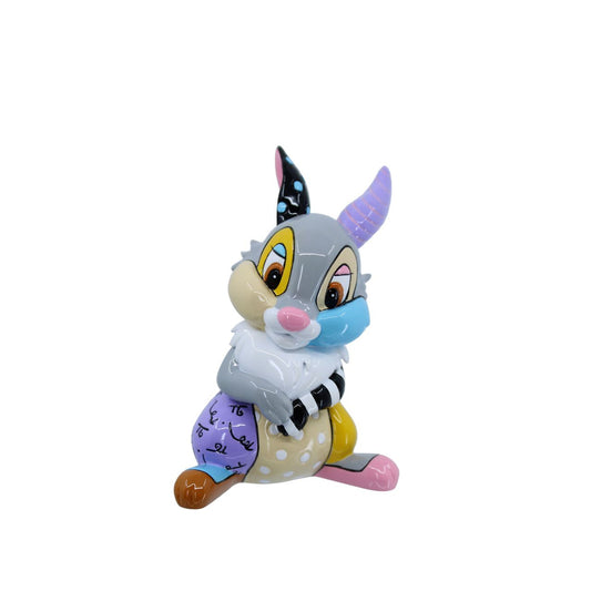A vibrant tribute to Disney's beloved Bambi character, thumper. Hand-painted with Britto's iconic pop art motifs, this charming collectible breathes new life into the playful, heartwarming rabbit.