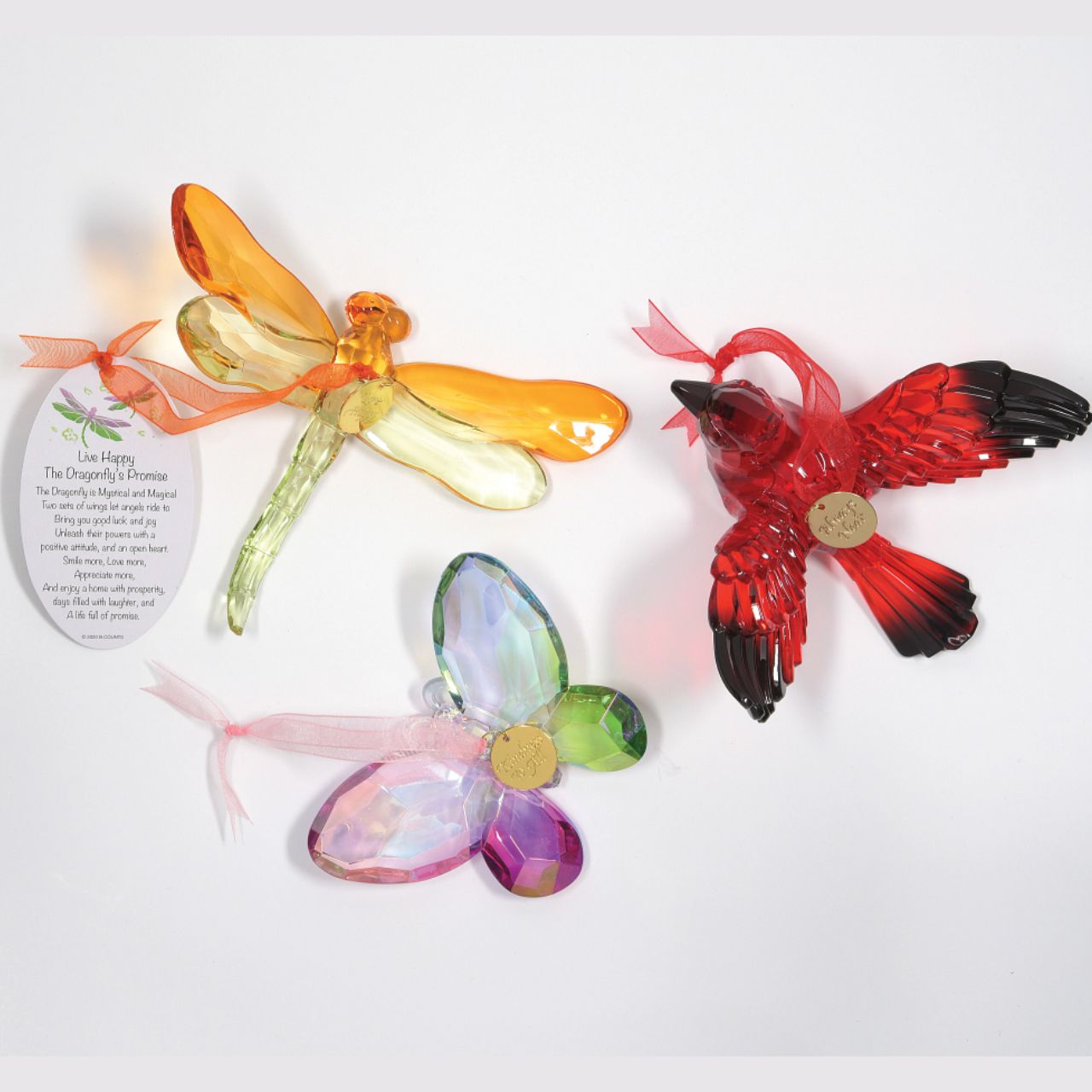 Suncatcher Butterfly Hanging Ornament with Charm and Poem  From the shelter of the cocoon, the butterfly brings this happy message. Smile Bigger, Hug Stronger, Laugh Louder, Dream in Colour, Breathe Deeper, Love Longer, Sing with Soul, Trust with Heart, and give to all Respect, Kindness and the Strength to Soar.