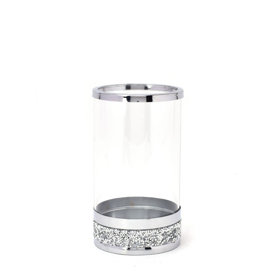 Hestia Candle Holder Glass with Diamante Base 10cm  This contemporary candle holder features an elegant metal effect rim and a stunning diamante base. With a clear glass tube plinth, simply add a pillar candle, votive or tealight to make the perfect table centrepiece.