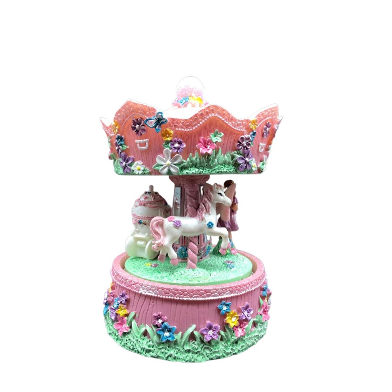 Music box Fairy Carousel. The colorful carousel, equipped with a fairy in a carriage, rotates to a melody.