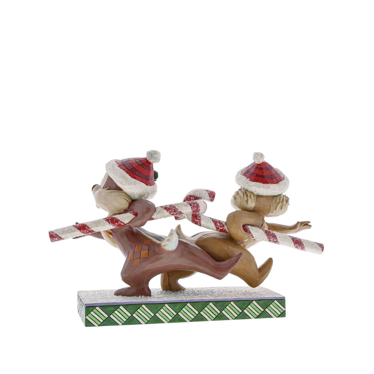 "Candy Cane Caper" Chip and Dale work at charming cross purposes in this beguiling design from the artistry of Jim Shore. Beautifully decorated with sparkling sugary accents, this comical Christmas piece blends Jim's distinctive style with the enduring humour of Disney.