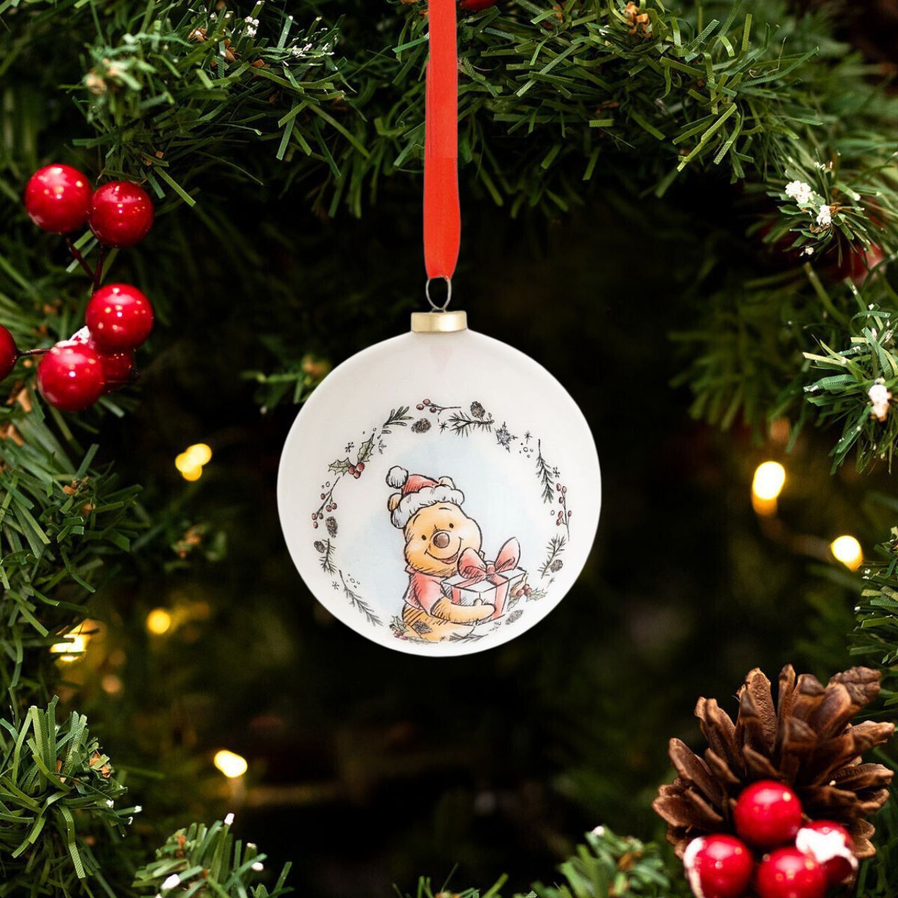 Make any tree a little more special this year by welcoming the warmth of Winnie the Pooh into the home. With heart-warming illustrations of the most recognisable characters, this set of baubles is sure to bring a smile to any little one's face.