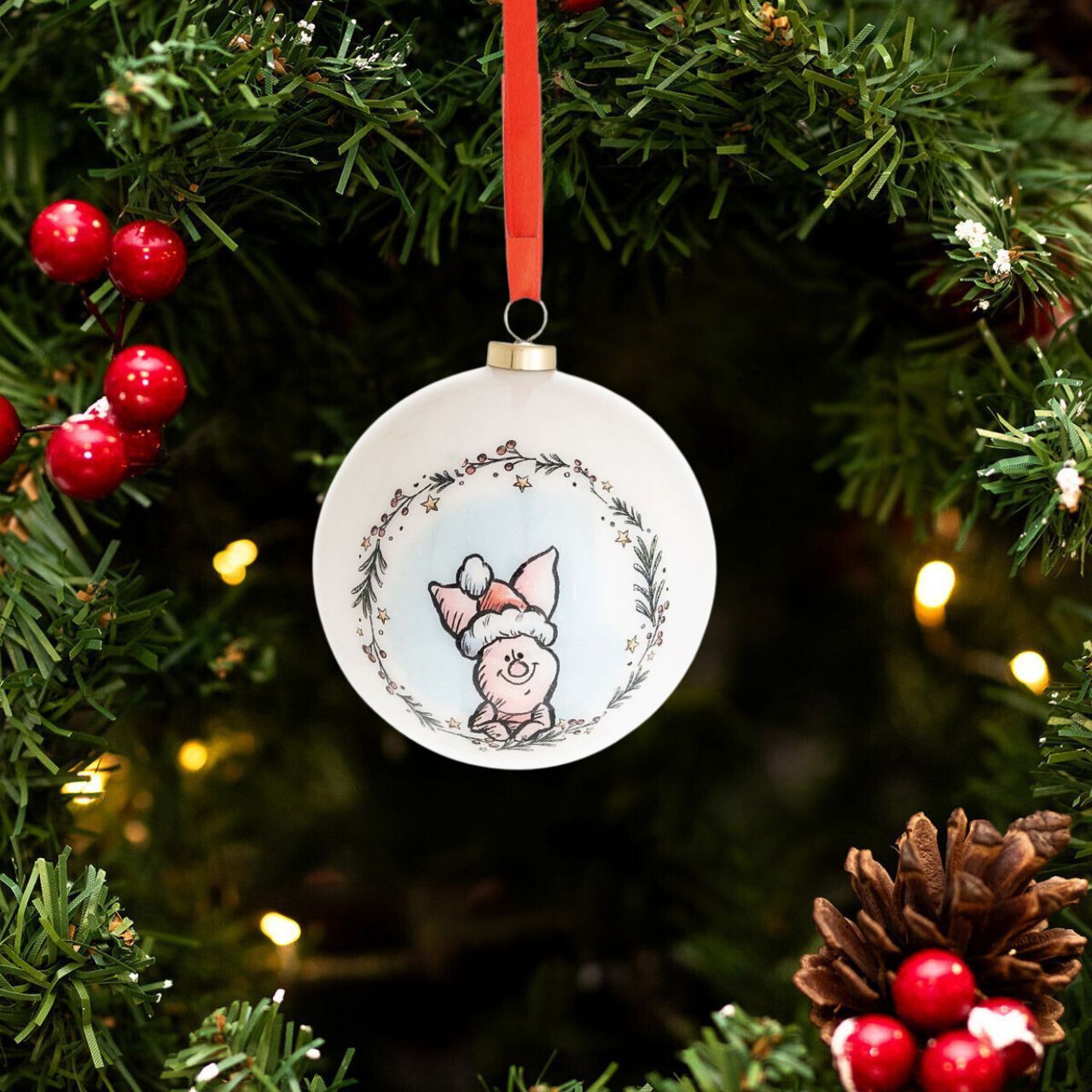 Make any tree a little more special this year by welcoming the warmth of Winnie the Pooh into the home. With heart-warming illustrations of the most recognisable characters, this set of baubles is sure to bring a smile to any little one's face.