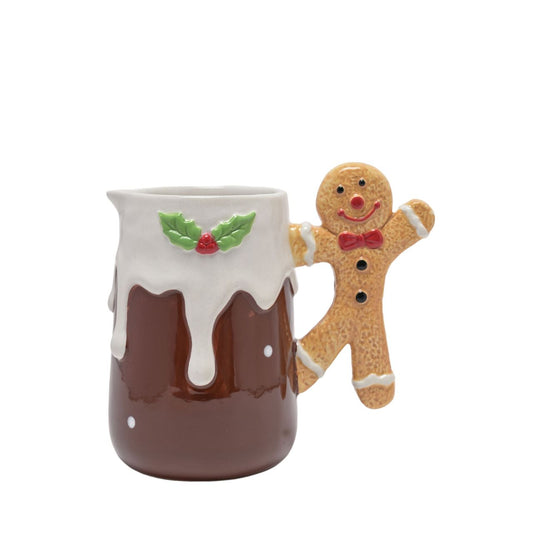 Bring the festive cheer into your home this Christmas with the Gingerbread Icing Jug. This beautifully crafted ceramic jug features a charming gingerbread man handle and holly decoration that will fill you with joy. 