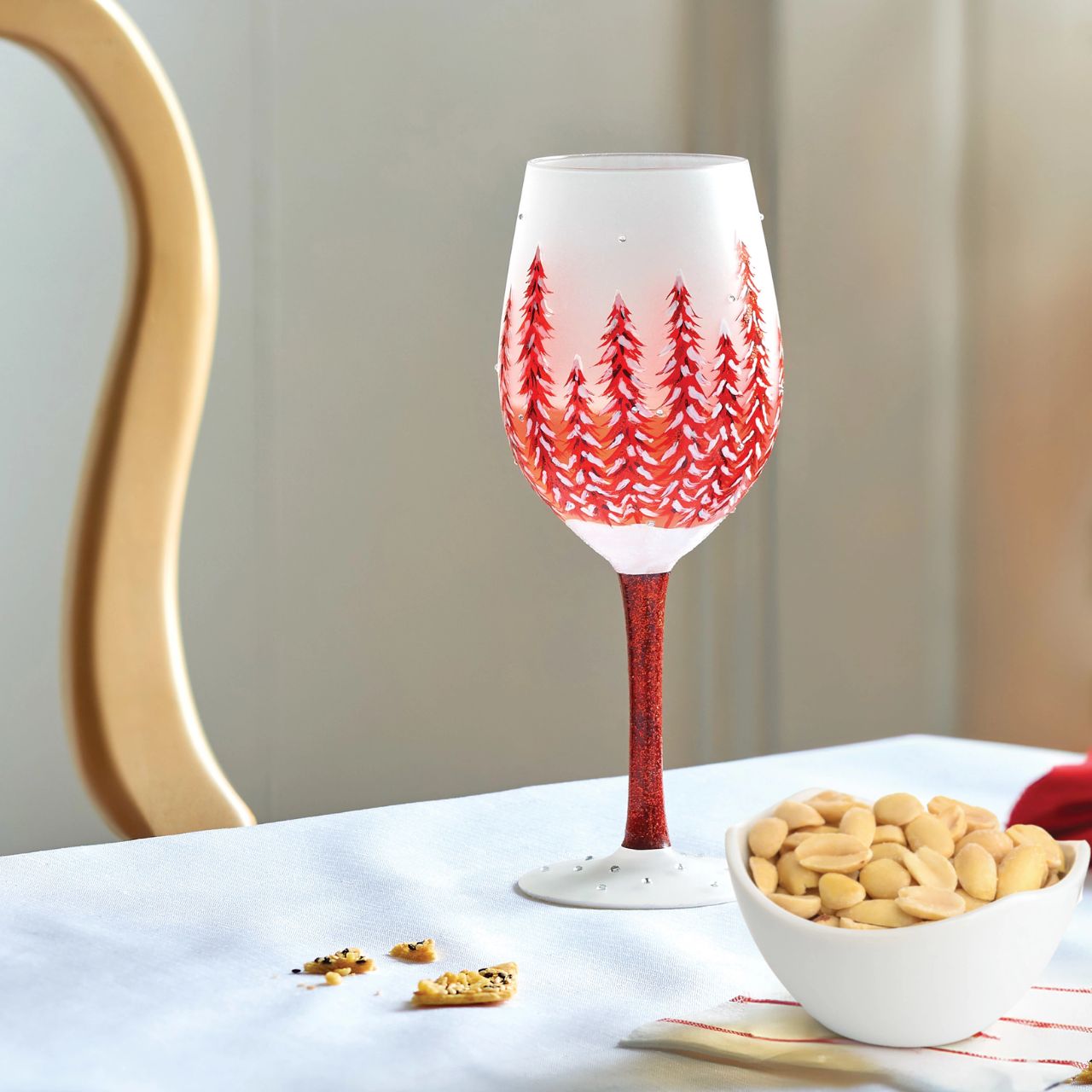 This gorgeous glass features a forest of red hand-painted pines covered in fresh fallen snow. With inlaid crystal snowflakes, this enchanting cup soothes with festive hue and sparkling elegance. Fill up you cup and give cheers to wintertime wonder. Each Lolita wine glass comes packaged in a branded gift box with an individual wine cocktail recipe on both the bottom of the glass and box.