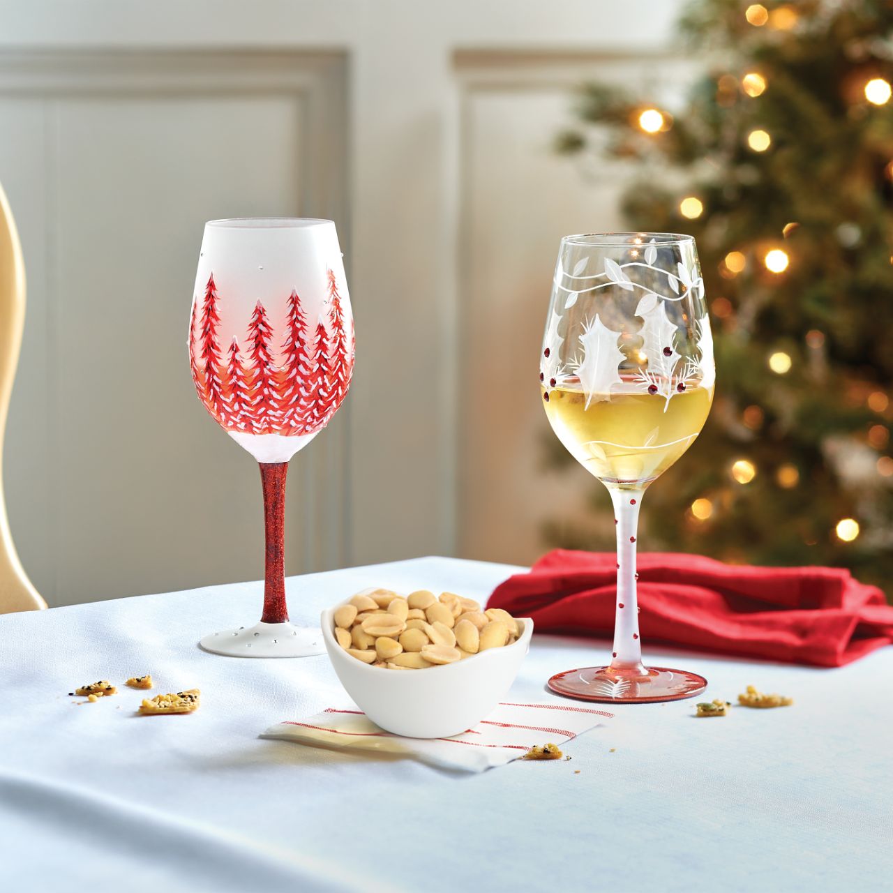 This gorgeous glass features a forest of red hand-painted pines covered in fresh fallen snow. With inlaid crystal snowflakes, this enchanting cup soothes with festive hue and sparkling elegance. Fill up you cup and give cheers to wintertime wonder. Each Lolita wine glass comes packaged in a branded gift box with an individual wine cocktail recipe on both the bottom of the glass and box.