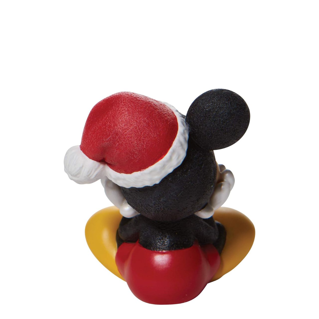 Department 56 Disney Christmas Mickey Mouse Figurine  Positively jolly, Mickey Mouse excitedly sits in this beautiful Christmas figure from Disney. With a song in his heart and holly in his hat, Mickey prepares to spend the season smiling. This is one mouse that won't be silent throughout the house.