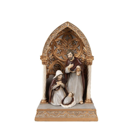 A decorative nativity scene figurine in gold color, with LED lighting, made from polyresin. In a classic style. It brings the Christmas atmosphere into any home. It‘s the perfect gift idea for Christmas decoration.