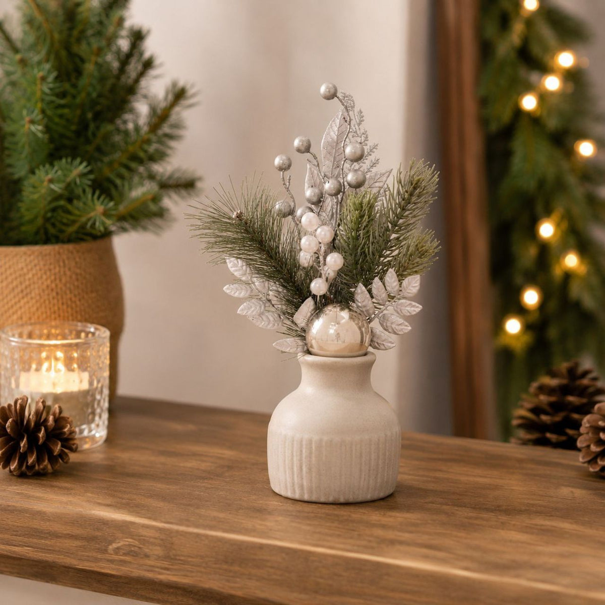 Introducing the sleek and stylish artificial Pine Needle Foliage and Baubles Stem, the perfect way to bring the outdoors in.