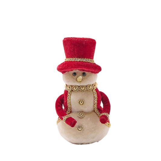 Add holiday charm to the home with this adorable Red Velvet snowman, ideal for spreading festive cheer. The snowman sports a red velvet hat and gold coloured scarf for a classic look. Perfect as a gift or décor, this plush snowman will warm hearts when placed on a mantel, shelf, or table.