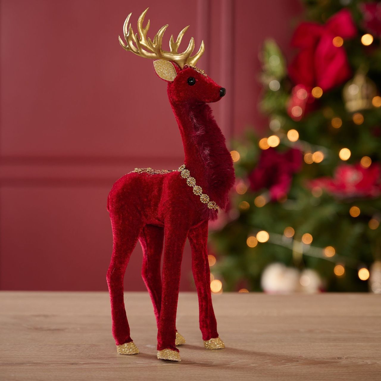 The majestic Red Velvet Standing Deer 33cm, will bring festive joy to the home this Christmas. With his plush red velvet coat and shiny golden antlers and necklace, this handsome fellow captures the magic of the festive season. 