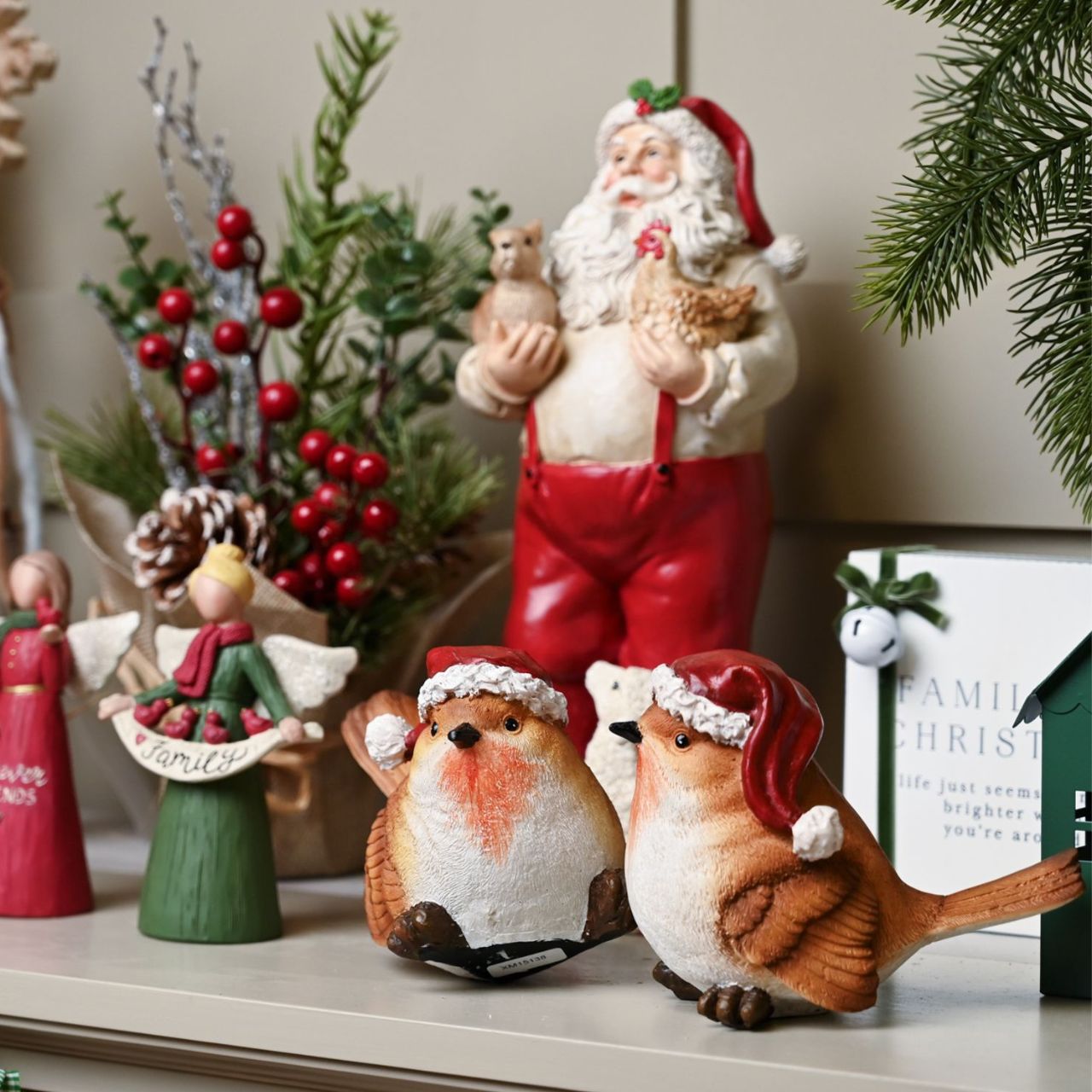Celebrate the festive season with these elegant Christmas Robin Figurines, meticulously crafted to bring a touch of nature’s charm to your holiday décor