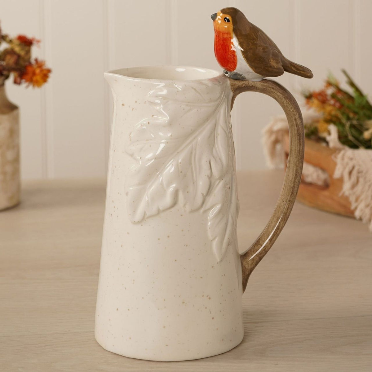 The Country Living Robin Leaf Jug is a characterful kitchen piece, featuring a sculpted robin detail perched on the rim, bringing a distinctive countryside-inspired touch to a classic jug design.