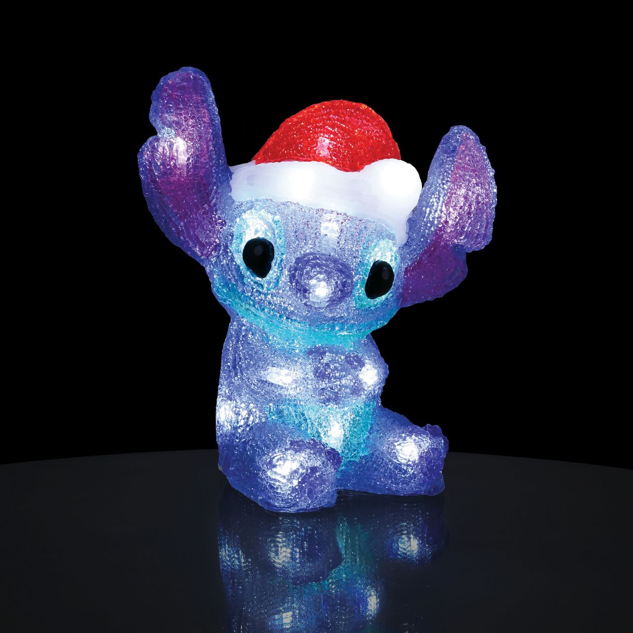 Add a touch of extra-terrestrial magic to your Christmas décor with this charming light-up Stitch| Sporting a festive Santa hat, its vibrant glow and playful design bring a unique flair to your celebrations.
