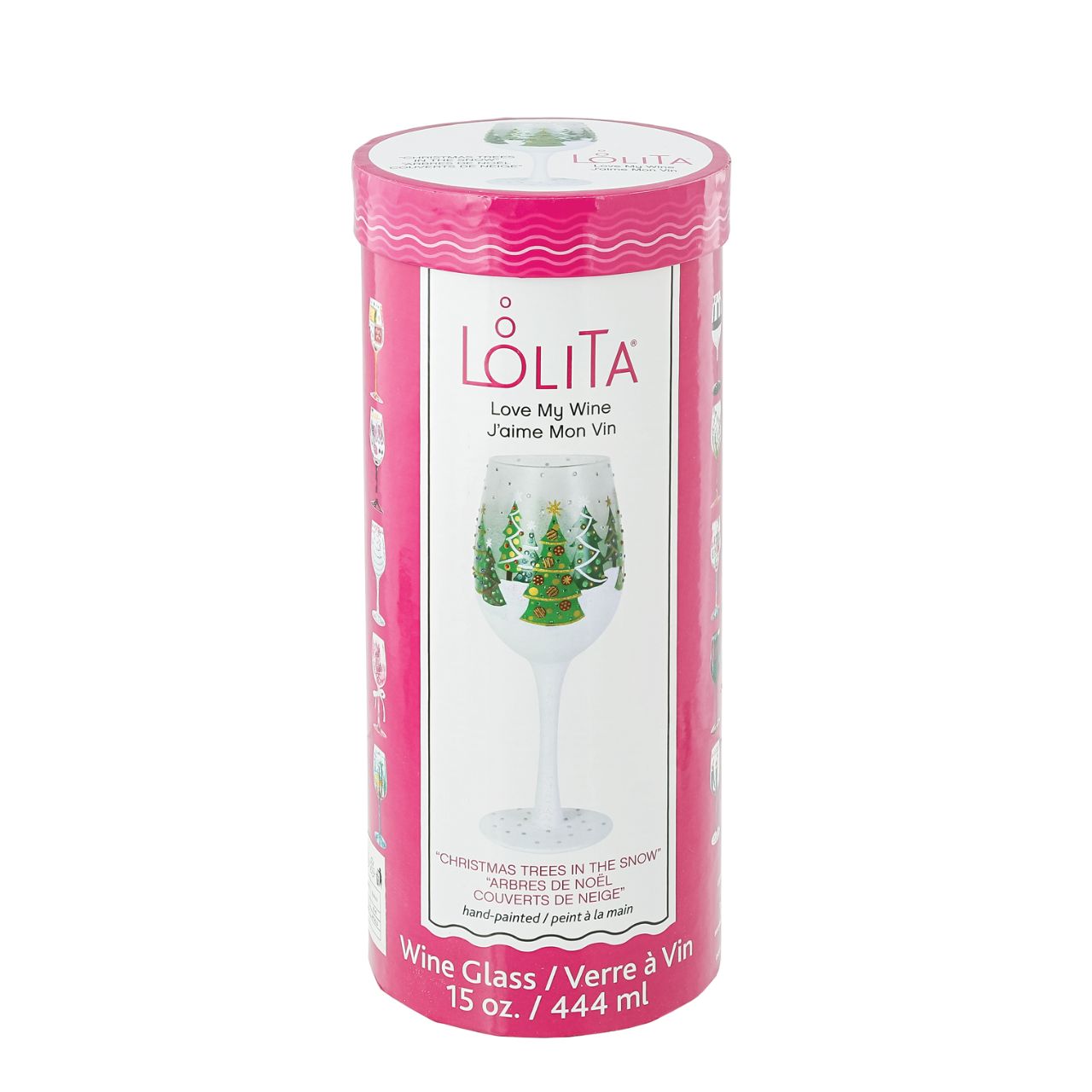 Christmas Trees in the Snow Wine Glass by Lolita  Christmas pines covered in lights and ornaments cover this winter wonderland wine glass. With textured snow and glittering accents, this wine glass is ready for wassail and snowflakes.