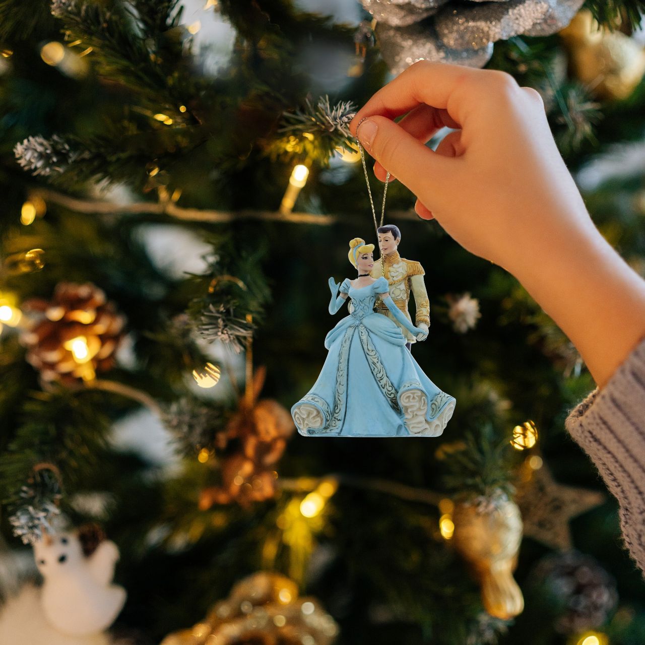 Cinderella and her Prince are the perfect couple to adorn your Christmas tree. Hand crafted and painted with great attention to detail as part of the Disney Traditions collection by Jim Shore.