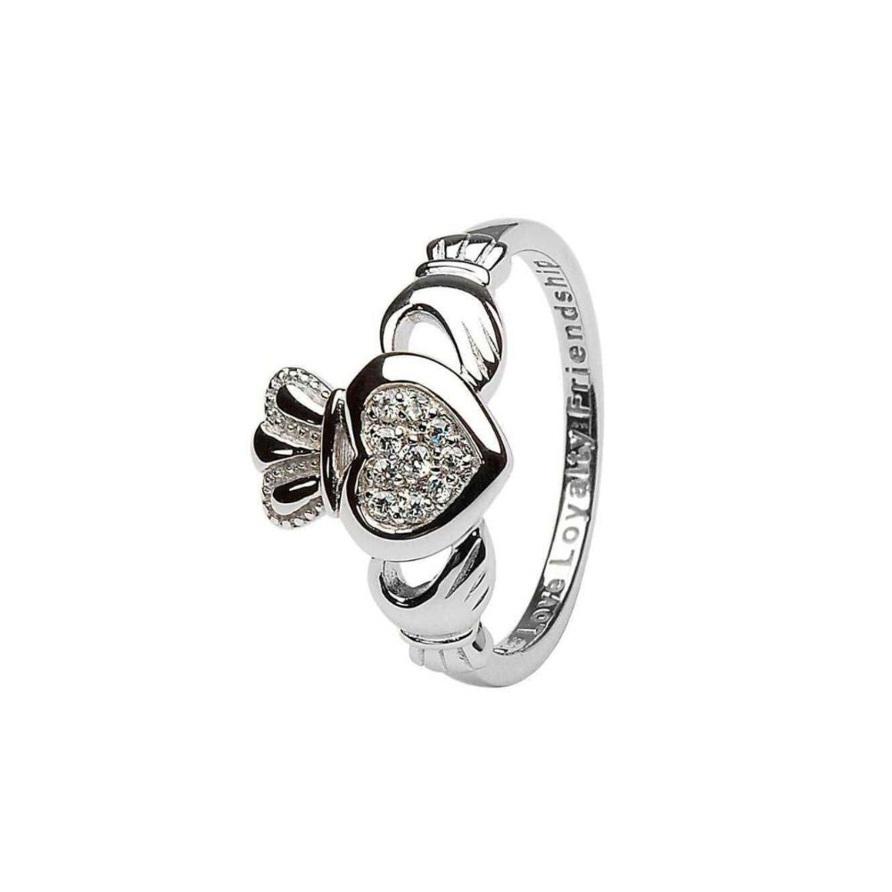 This exquisite ring is a fresh and mature take on the famous Celtic lover's band: the Claddagh Ring. Crafted delicately of Sterling silver, the ring is wonderfully detailed- from the cuffs around the hands to the patterns on the crown. But the true focus of the ring is rightly on the central heart. There ten brilliant CZ's are pave set in the heart itself to form a glorious focus for the ring.