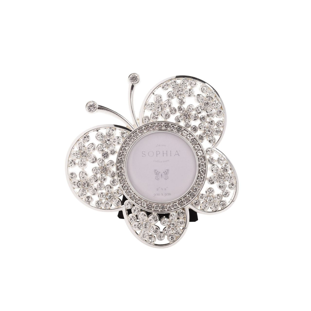 Behold the Sophia Classic Butterfly Frame, a dazzling tribute to nature's beauty. This silver-toned butterfly-shaped frame, adorned with an array of sparkling crystals, promises to be a focal point in any room against a crisp white background.