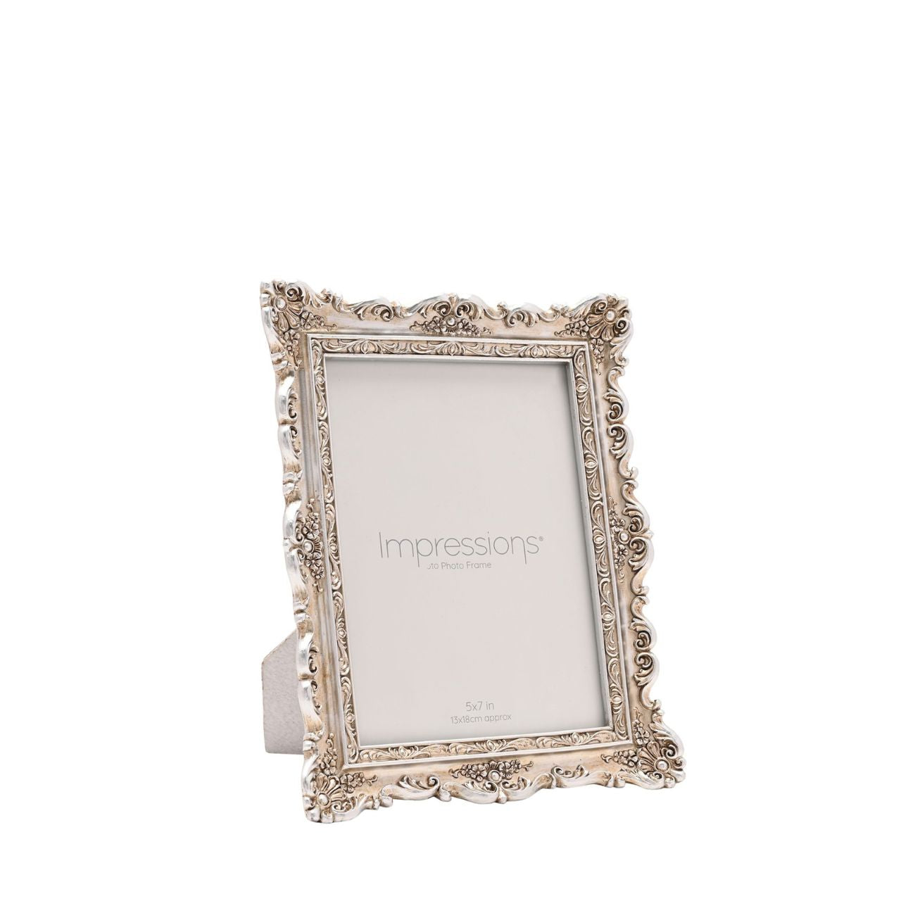 Introduce a touch of elegance to your decor with the Impressions Classical Design Resin Photo Frame 5" x 7". This ornate frame, with "Impressions" artfully printed on the glass surface, offers a stylish backdrop for your cherished memories.
