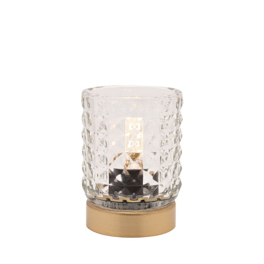 Its textured glass shade casts a soft ripple shadow and will emit a lovely soft glow. Finished on a brushed brass effect base and is operated by an on off switch to the base.