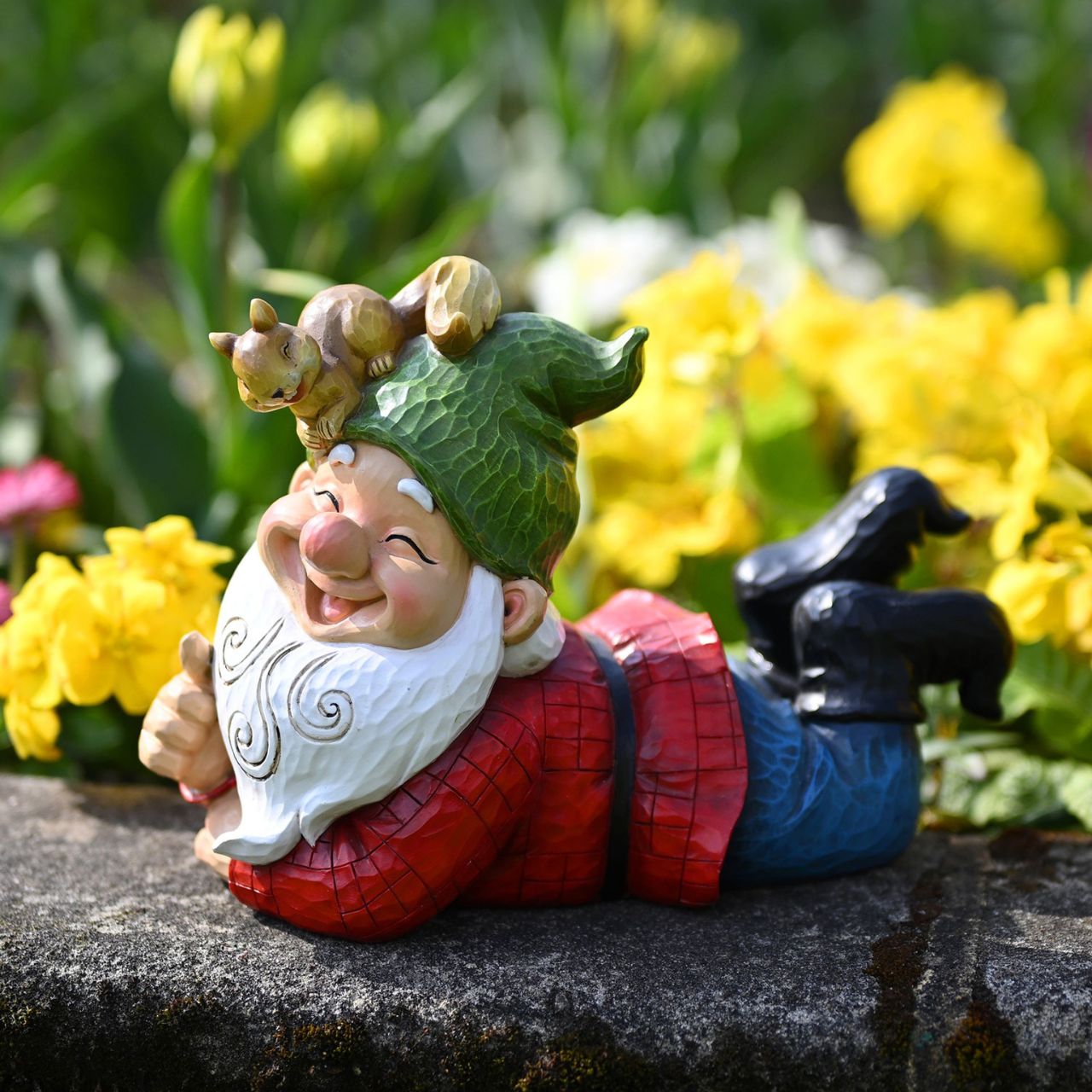 "Country Living" Garden Gnome With Squirrel  Bring some rustic cheer to your outdoor living space with this charming hand painted gnome. From Country Living - bringing you closer to nature.