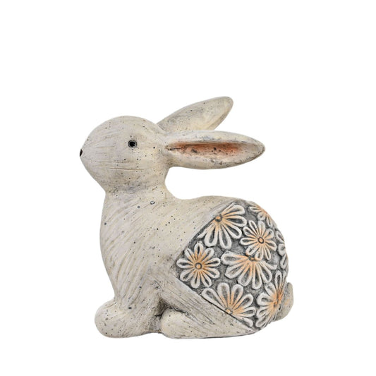 Welcome the charm of the countryside into your retail collection with the petite Country Living rabbit figurine. For spring, this adorable figurine is designed to capture the essence of a quaint country cottage, bringing a touch of rustic elegance into the home.
