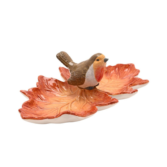 Featuring a robin perched on a textured leaf, it combines warm tones with natural charm. Perfect for holding jewellery, keys, or other small items, it’s a practical addition to dressers, side tables, or entryways.