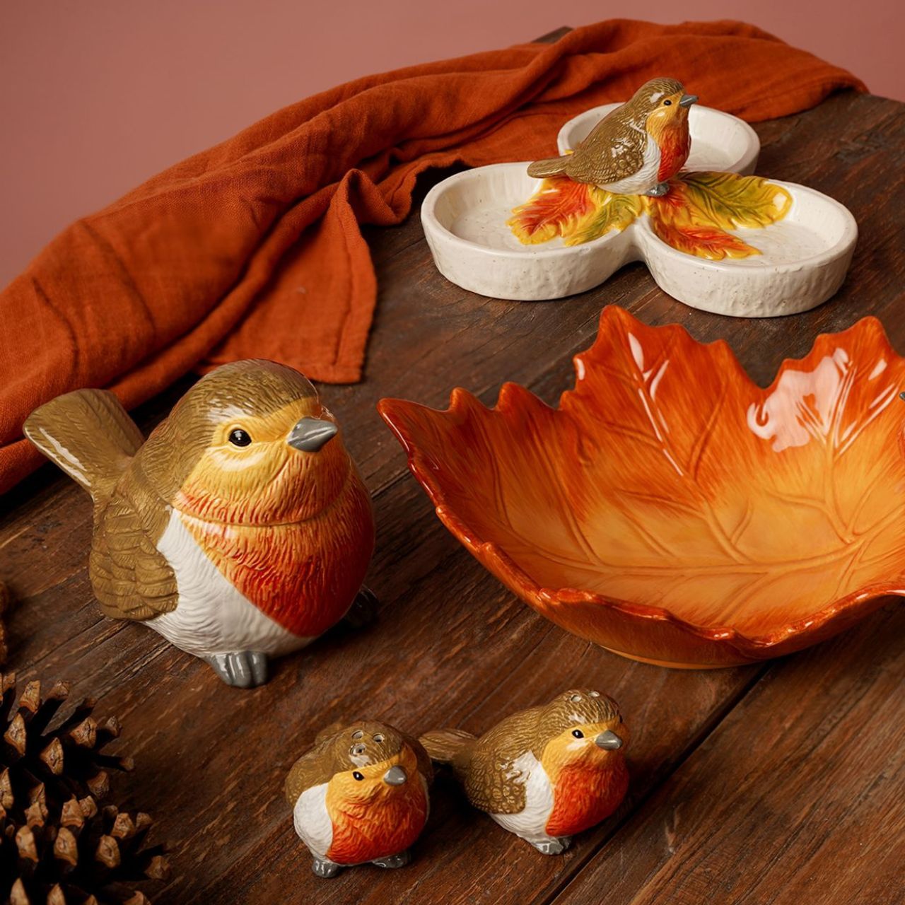 This ceramic jar features a colourful robin figurine with removable lid. An eye-catching piece, perfect for storing dry goods or treats.