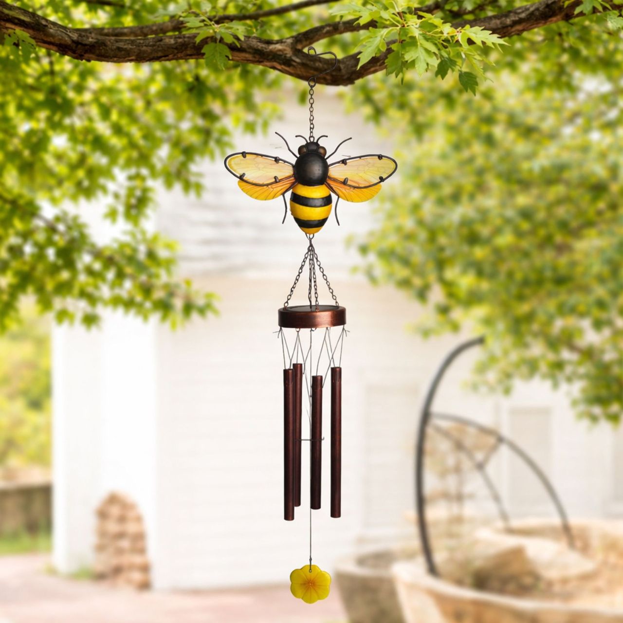 A decorative solar windchime featuring a detailed bee design, bringing a charming, nature-inspired touch to any outdoor space. The warm tones and delicate detailing create an eye-catching feature for gardens, patios, or balconies.