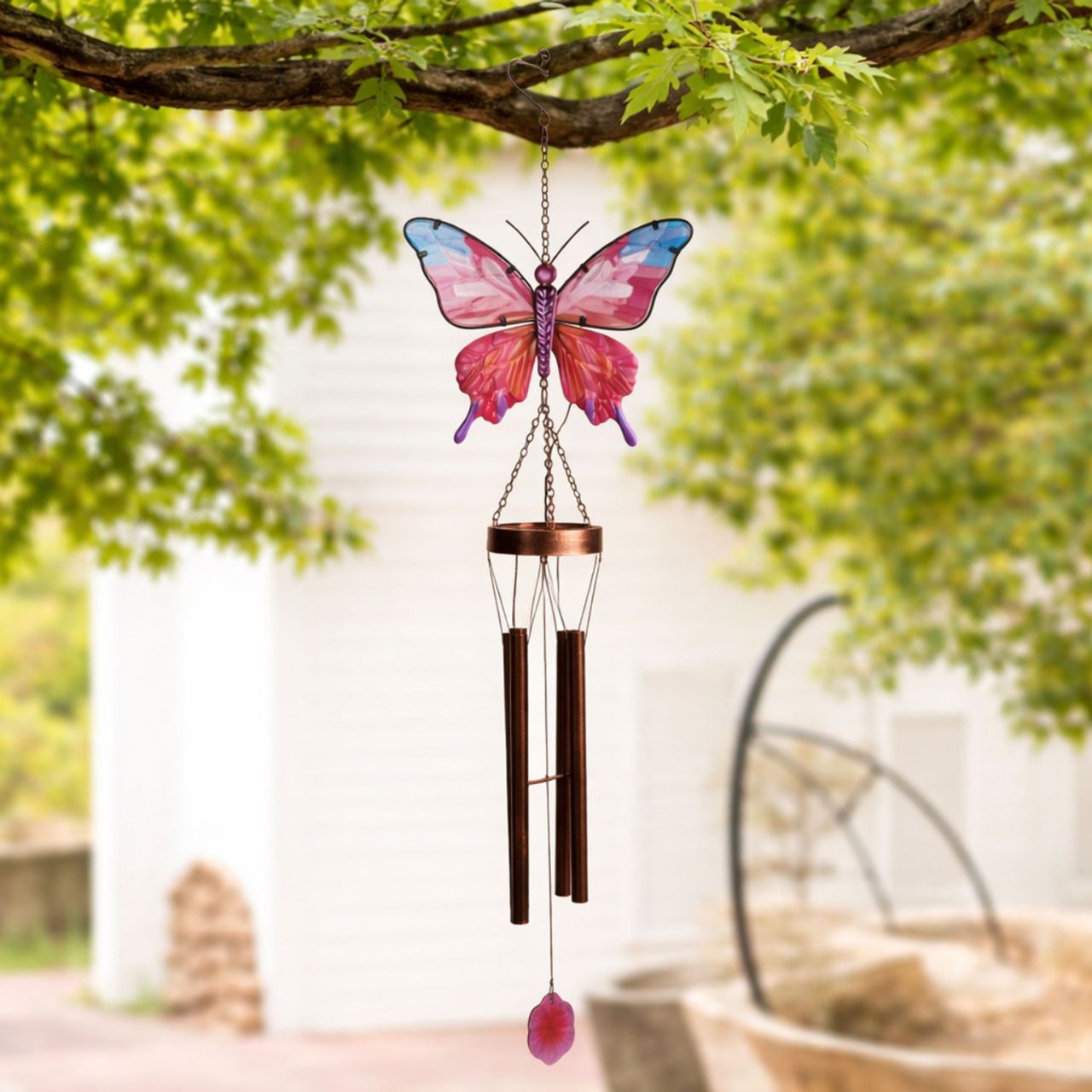 A decorative solar windchime featuring a colourful butterfly design, bringing a vibrant, nature-inspired touch to any outdoor space. The delicate detailing and soft blend of colours create an eye-catching feature for gardens, patios, or balconies.