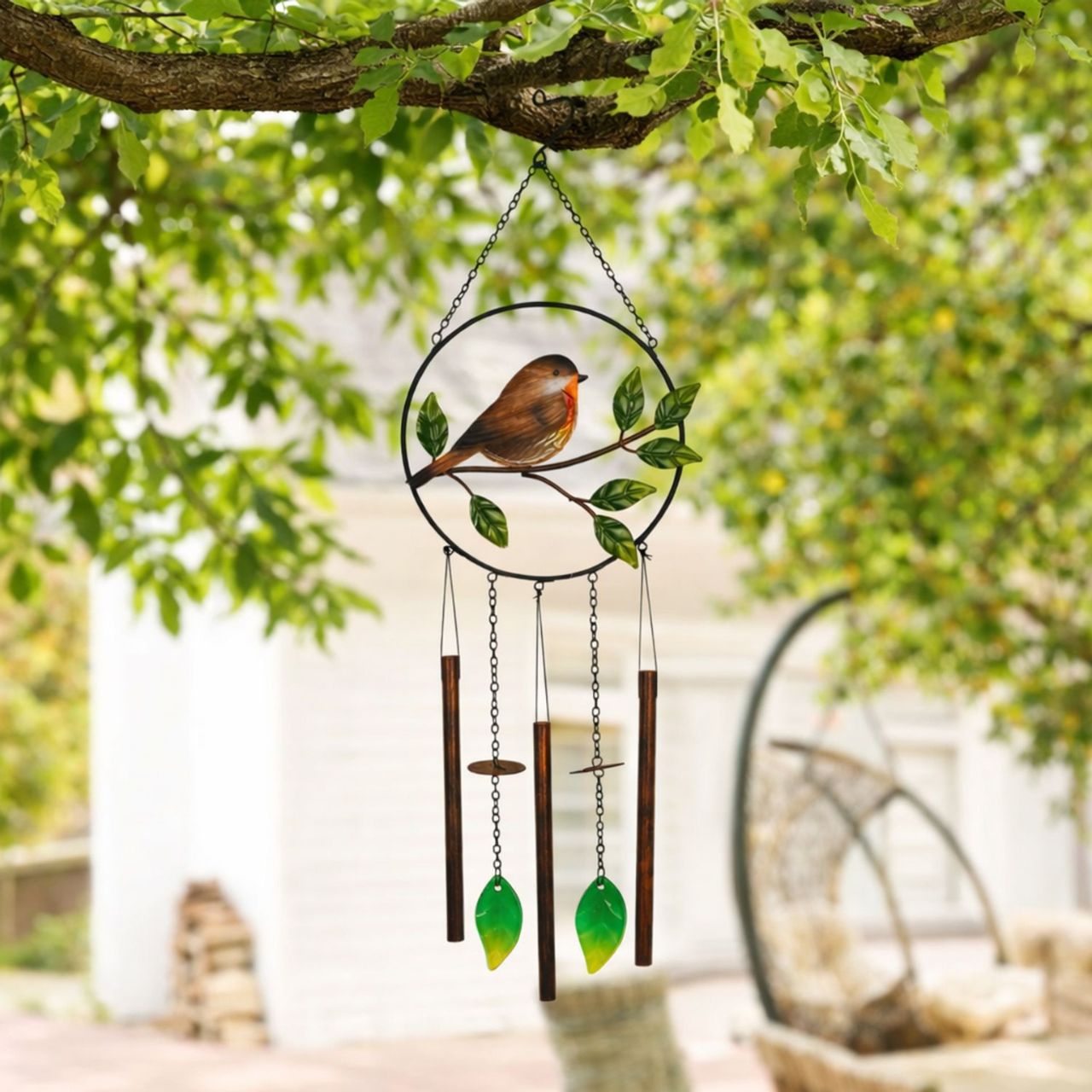A decorative windchime featuring a charming robin perched on a branch, bringing a peaceful, nature-inspired touch to any outdoor space. The detailed design and soft natural tones create a warm and inviting feature for gardens, patios, or balconies.