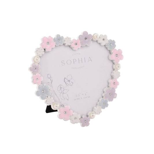 Make your memories bloom with the Sophia Classic Daisy 4 x 6 Heart Frame in Pastel. This heart-shaped frame, adorned with delicate white and pink flowers, offers a charming home for your cherished photos, adding pastel charm to any decor.