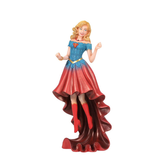 Fierce meets fabulous in this meticulously reimagined hand-crafted figure inspired by DC Comics most iconic heroines and villains. Shimmering with metallic paint accents on her flowing stylish skirt, Supergirl is mid-flight ready to conquer the world.