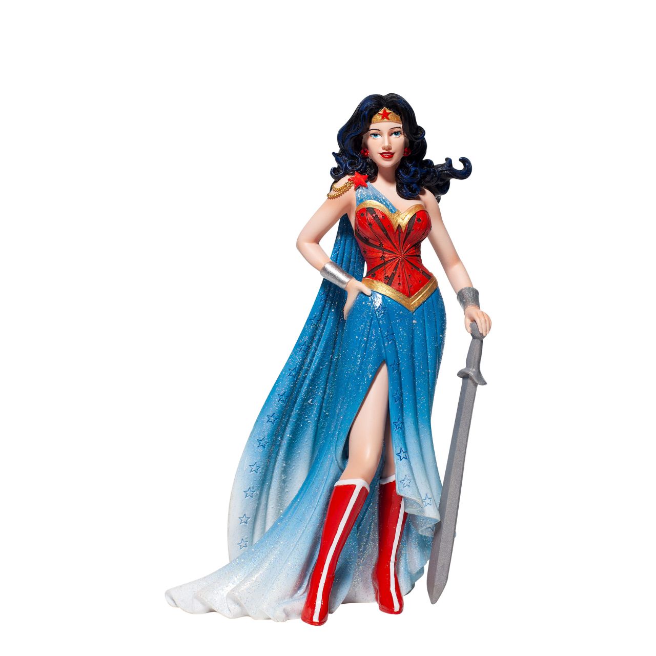 DC Comics Wonder Woman Couture de Force Figurine  Fierce meets fabulous in this meticulously reimagined hand-crafted figure inspired by DC Comics most iconic heroines and villains. Shimmering with glitter and metallic gold accents on her flowing cape and stylish skirt, Wonder Woman stands ready to conquer the world.